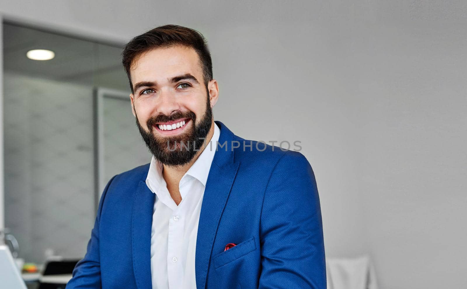 portrait of a young businessman in the office