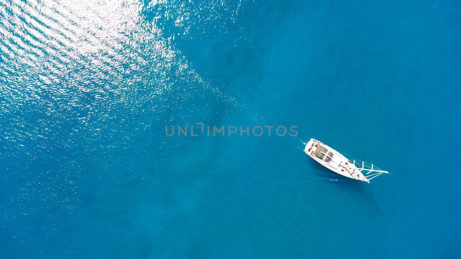 amazing view to yacht, swimming woman and clear water