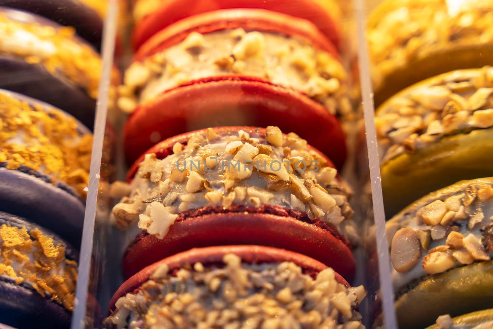 cakes with ice cream on the store counter , cafe showcase, dessert for coffee and tea. Cake displayed in shop window of cafe. Blurred background, selective focus, nobody.