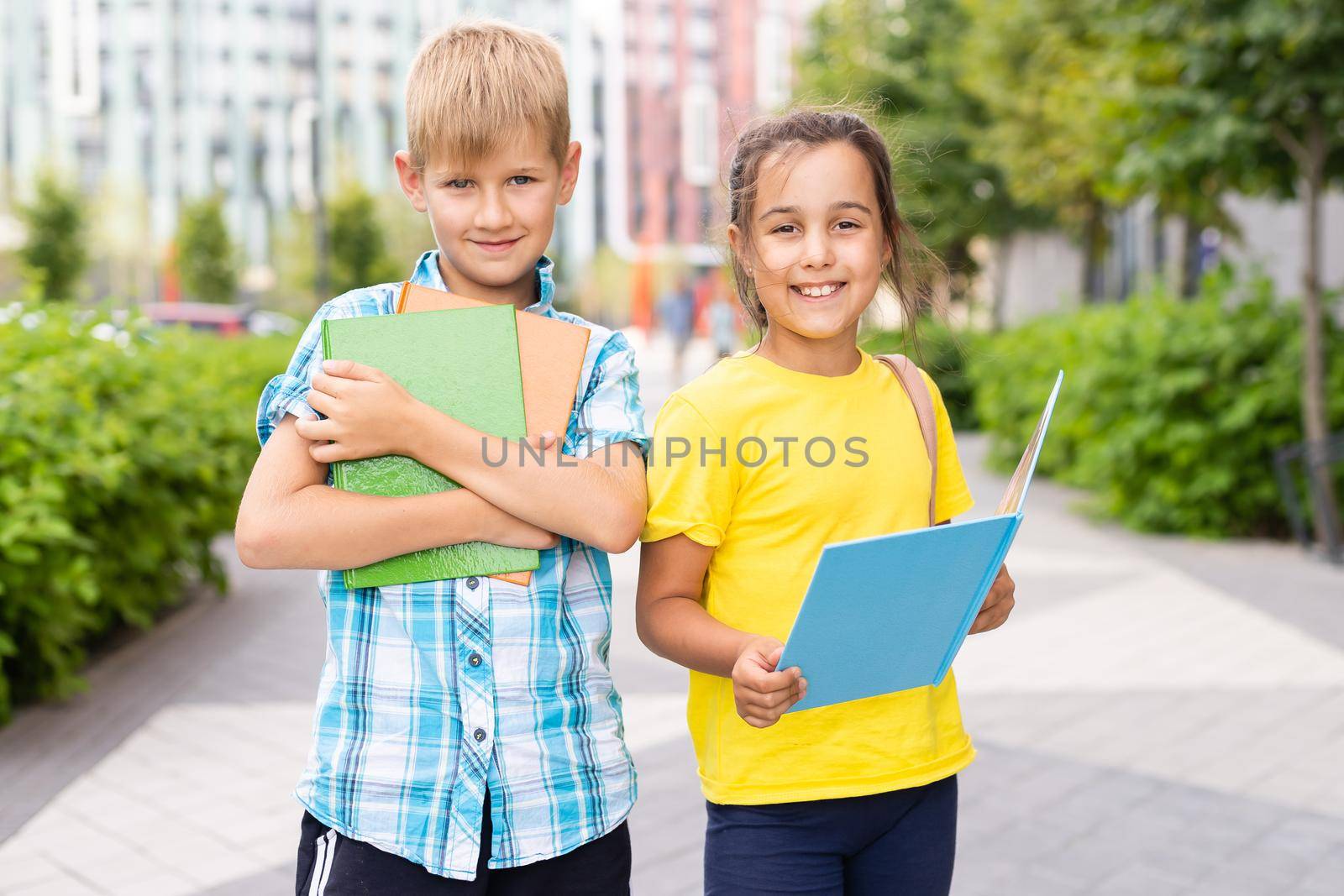 Portrait of smiling little school kids.