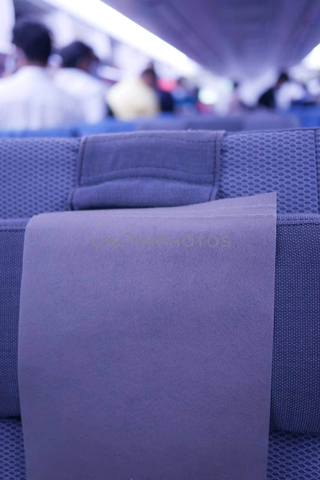 purple color Empty passenger airplane seats in the cabin,
