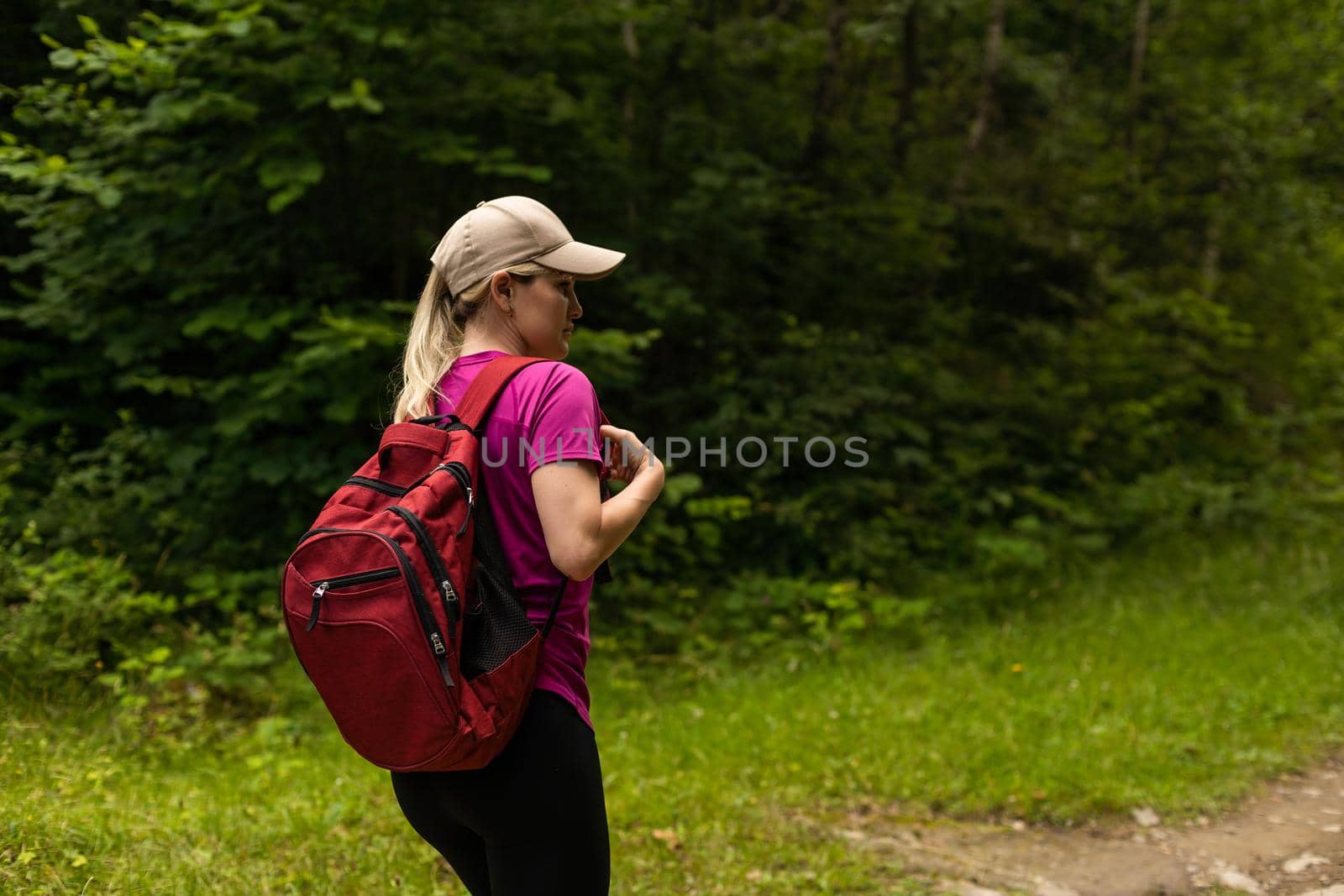 Fit woman walking on the mountain. Healthy lifestyle concept by Andelov13