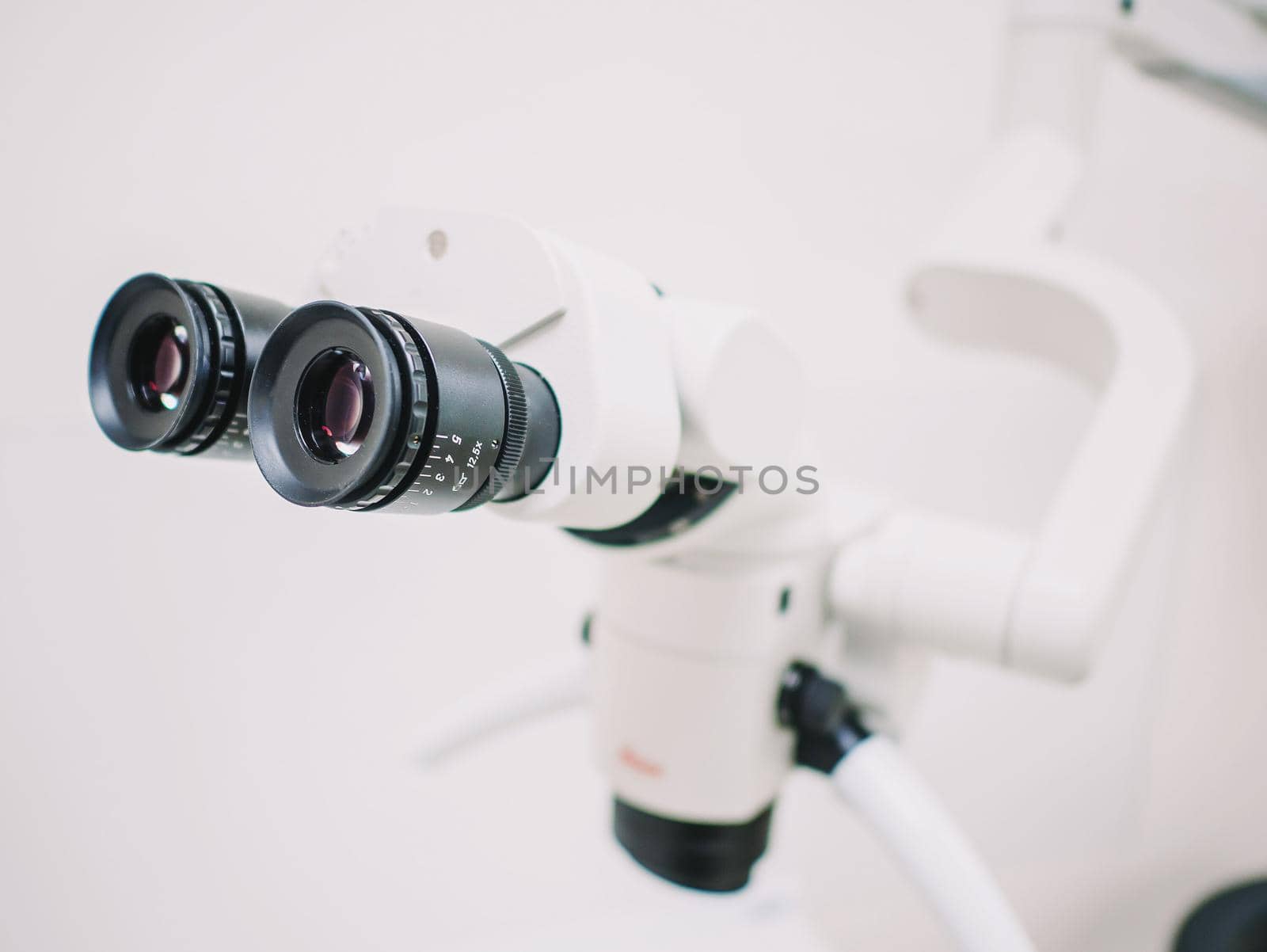 The image of the professional Dental endodontic binocular microscope by kristina_kokhanova