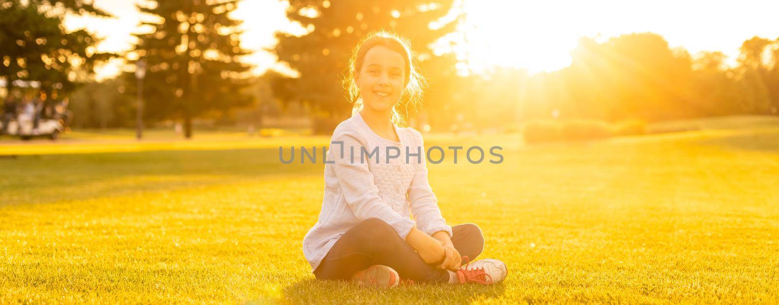 happy little girl in summer park by Andelov13