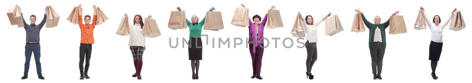 a group of people are running paper shopping bags by asdf