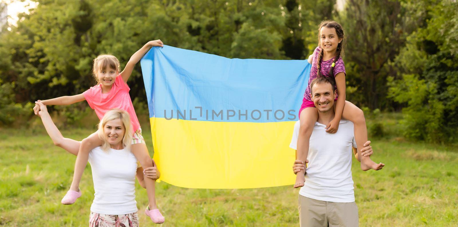 family with the flag of ukraine by Andelov13
