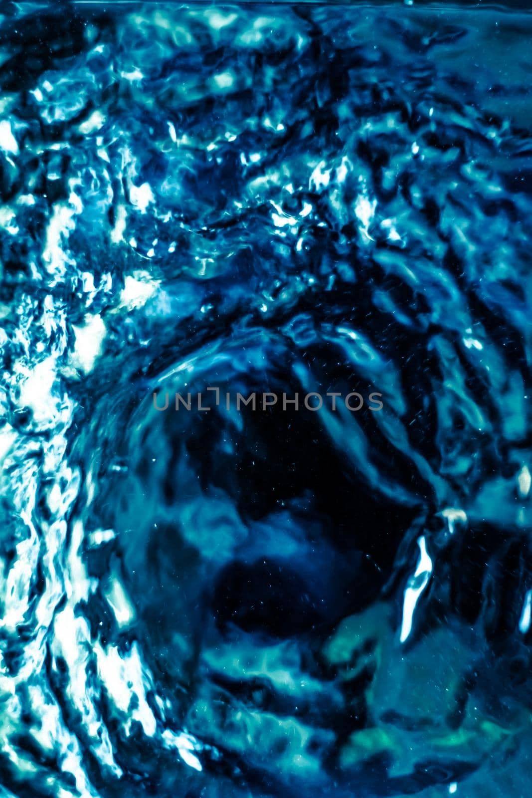 Abstract blue liquid surface as background - futuristic design and science concept. Deep blue waters