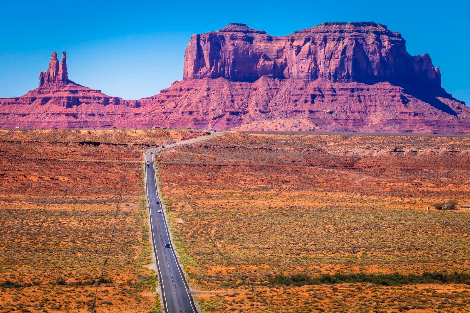Highway Road U.S. Highway 163 and Monument Valley at sunset, Arizona, United States