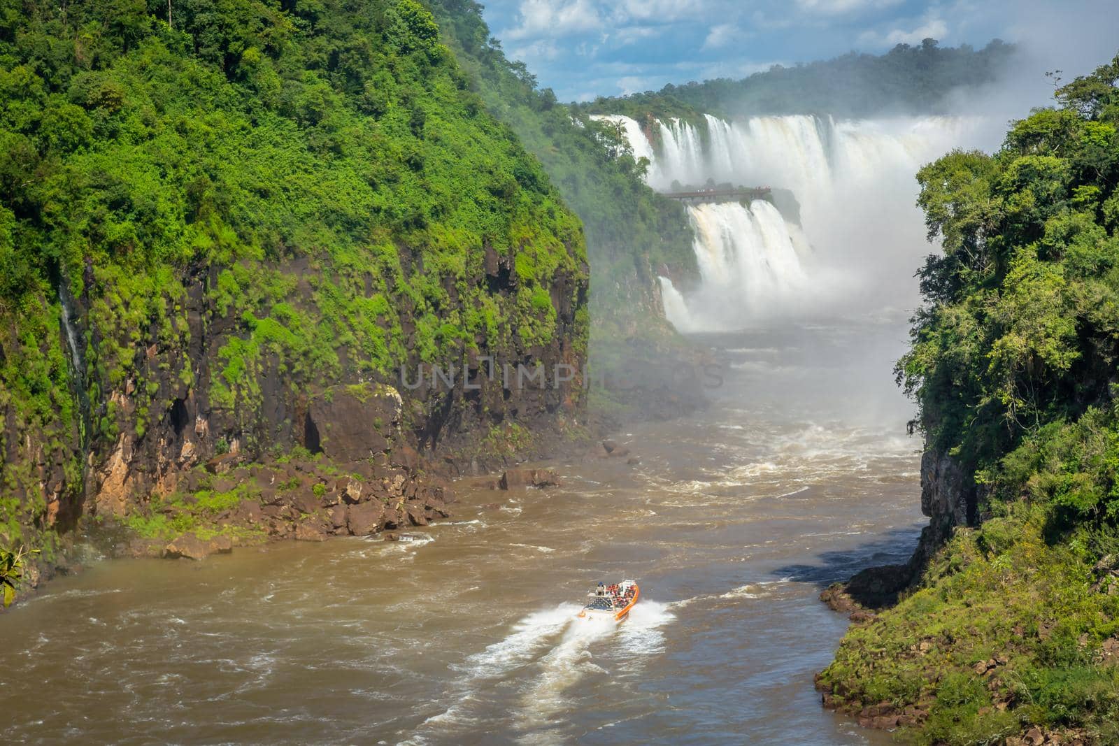 Speed boat on the Iguazu river at the Iguazu Falls, view from above, Argentine side