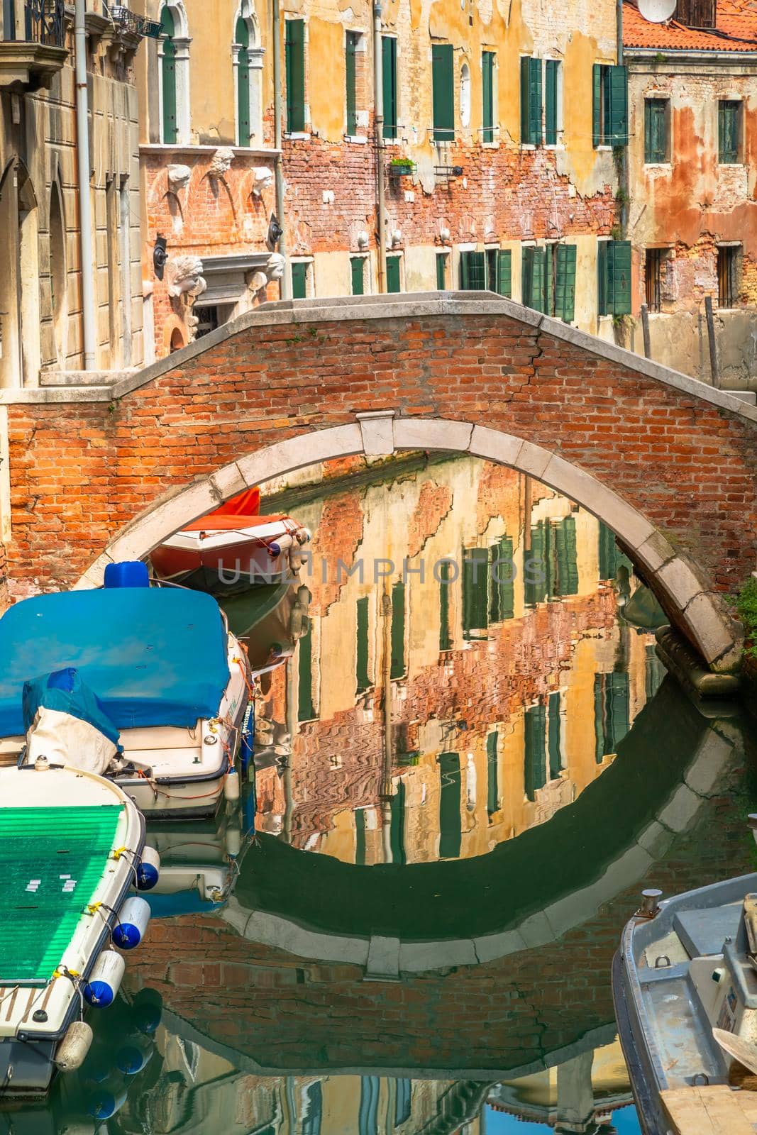 Peaceful Canal scenary in romantic Venice at springtime, Northern Italy