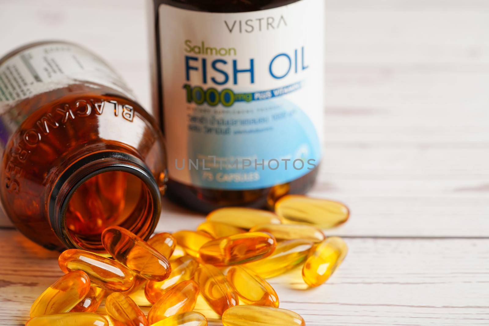 Bangkok, Thailand - April 27, 2022 Fish oil or Cod liver oil gel in capsules with omega 3 vitamins, supplementary healthy food
