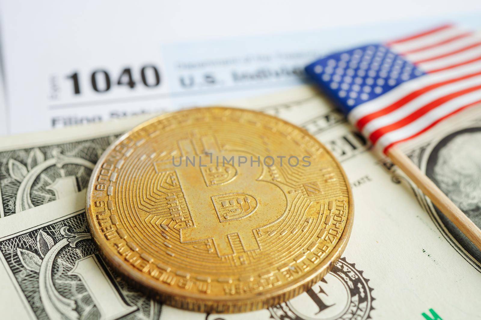 Tax form 1040 U.S. Individual Income Tax Return and bitcoin, business finance, Digital currency, Virtual cryptocurrency concept.