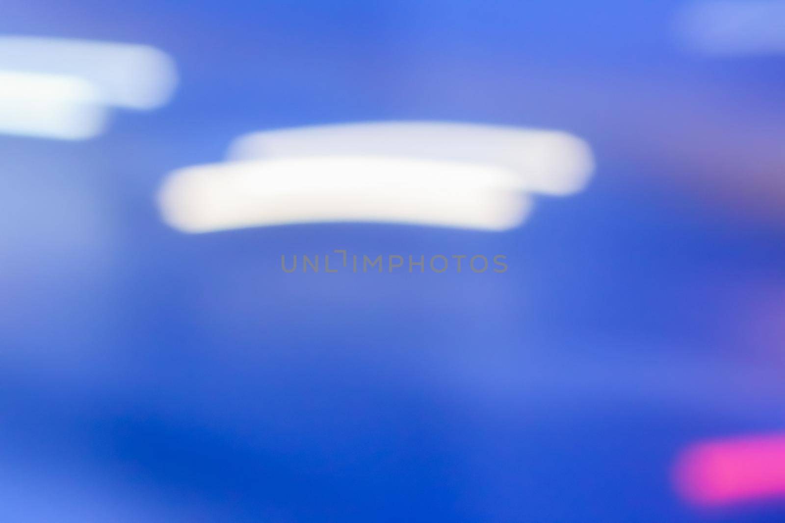 Abstract background, defocused textures and modern design concept - Evening city lights in motion