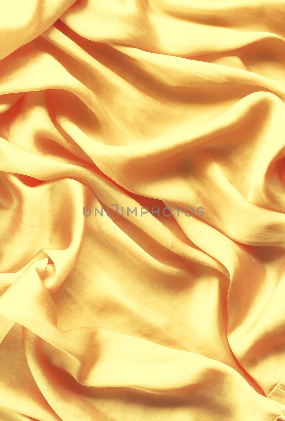 Luxury golden silk background texture - elegant fabric textures, abstract backgrounds and modern pastel colours concept