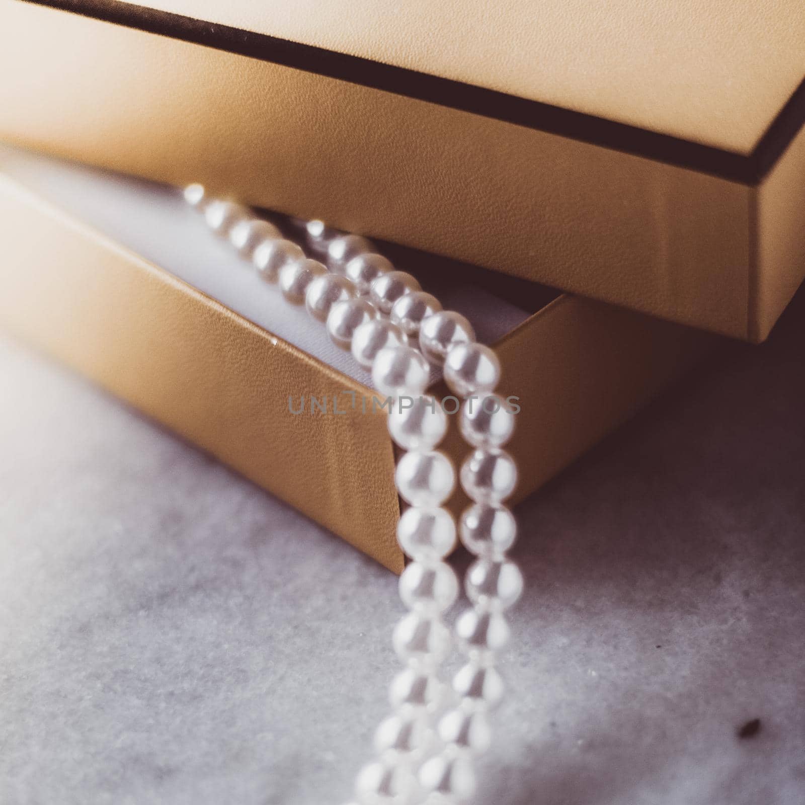 Valentine's day ideas, luxury shopping and holiday inspiration concept - Pearl jewellery in a vintage golden gift box