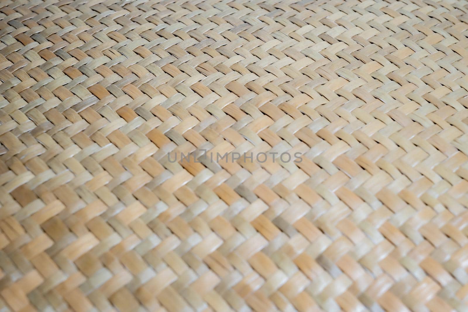 A specific focused point of abstract wicker texture of bamboo weaver. by Ballstertrw