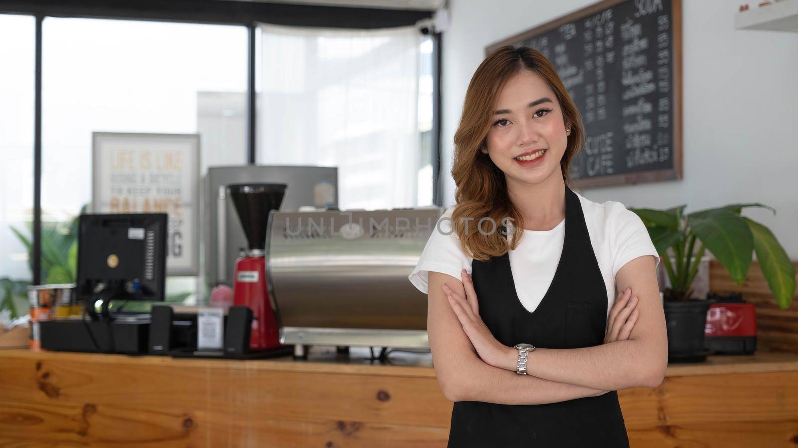 Portrait of Startup successful small business owner in coffee shop.handsome man barista cafe owner. SME entrepreneur seller business concept..