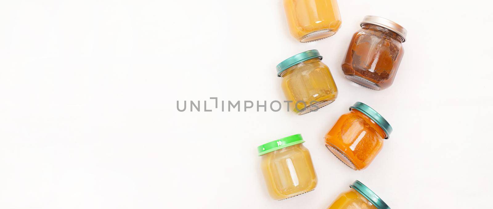 Layout of Puree for baby food with vegetables and fruits. Selective focus. nutrition. The first complementary feeding of the child. A happy child. A well-fed child. Copy space. by alenka2194