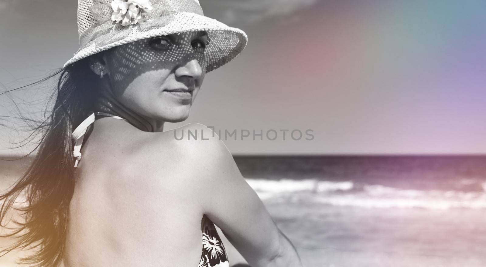 young woman in hat on beach. woman in bikini and sun hat download photo