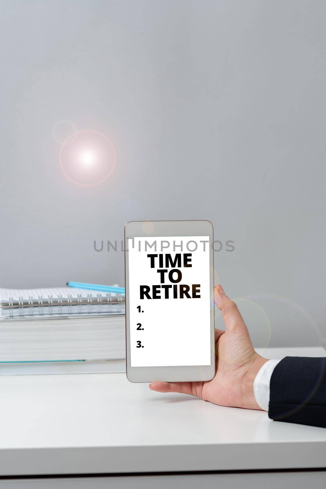 Writing displaying text Time To Retire. Business showcase Take the pensioner status stop working in elderly old enough Important Messages Presented On Mobile Phone Leaning On Books And Notebook. by nialowwa