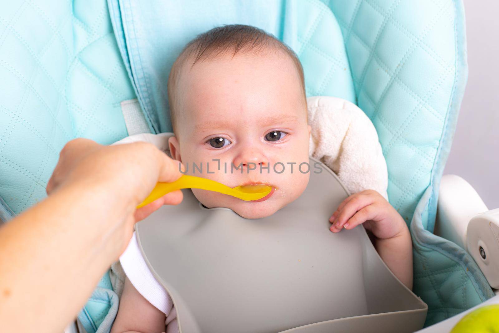 Puree for baby food with vegetables and fruits. Selective focus. nutrition. The first complementary feeding of the child. A happy child. A well- fed child