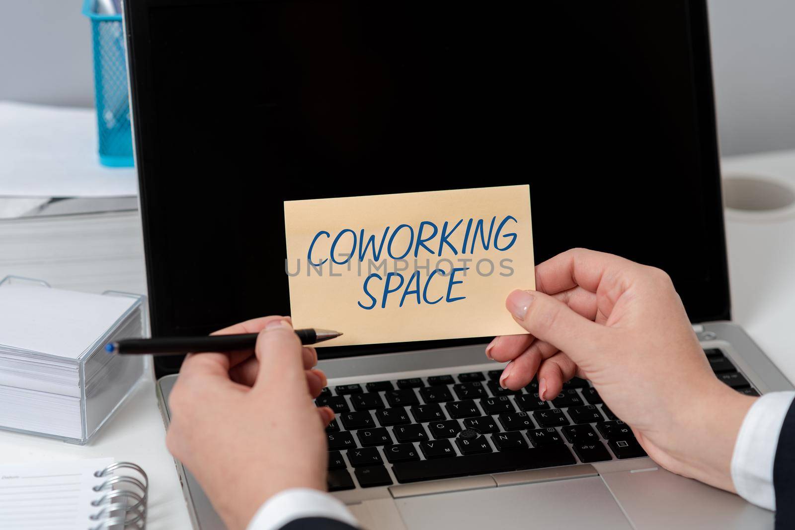 Conceptual caption Coworking Spacequestion. Business showcase Business services providing shared offices to work E Colleagues Climbing Upwards Mountain Reaching Success Presenting Teamwork by nialowwa