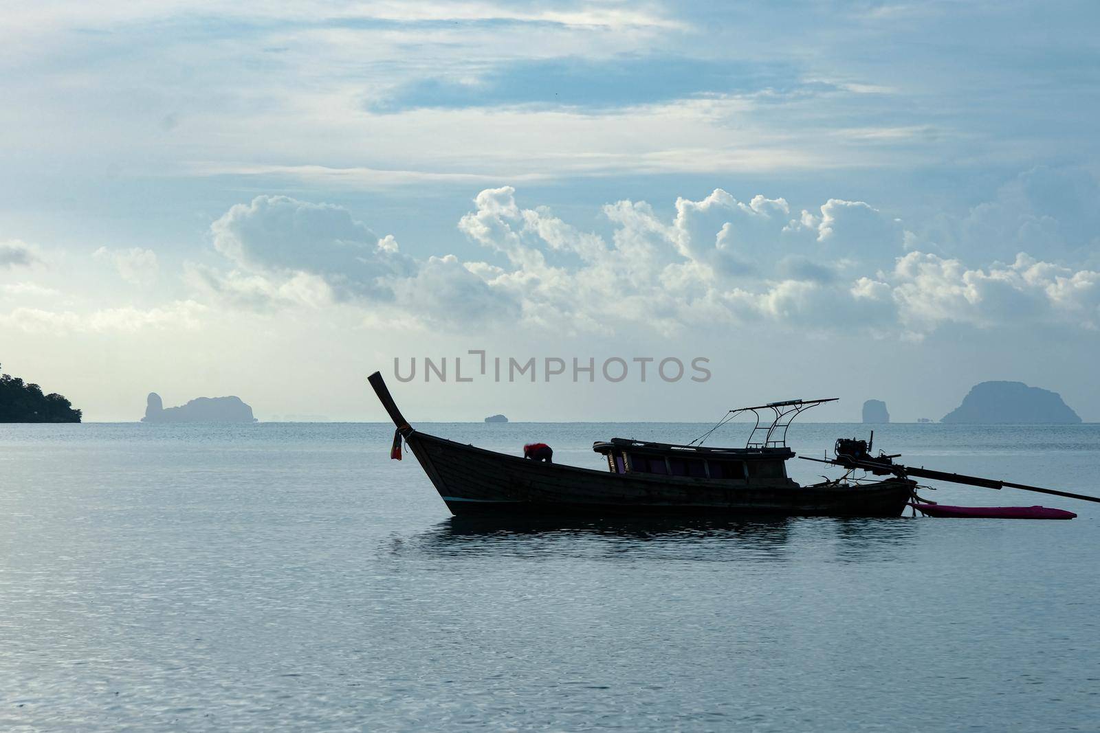 Aerial view of Thai traditional longtail fishing boats at the pier. Transportation and travel concept.