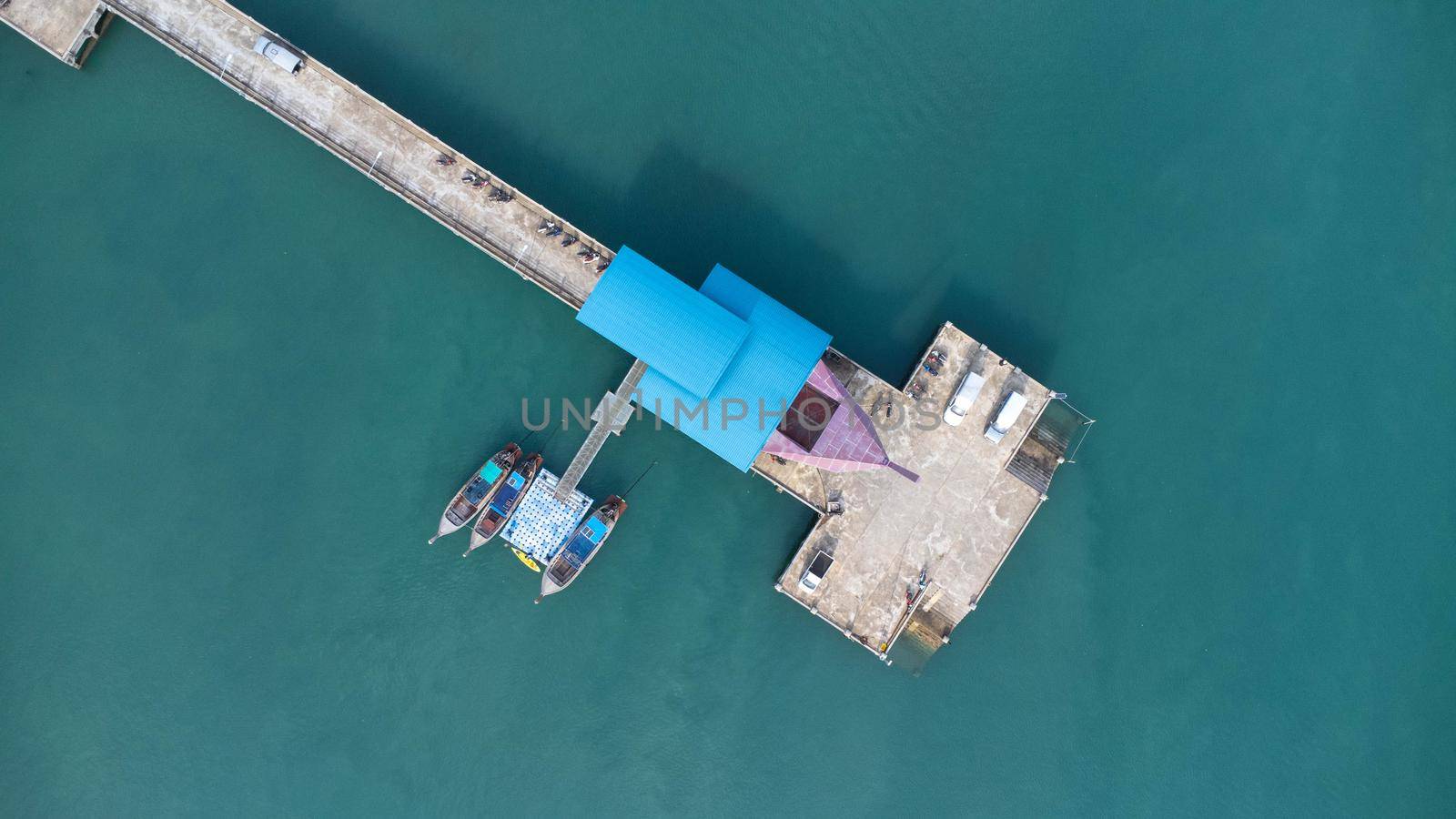 Aerial view from drone of Yacht and cruise ship parked in the marina. Transportation and travel background, beautiful sea in summer.