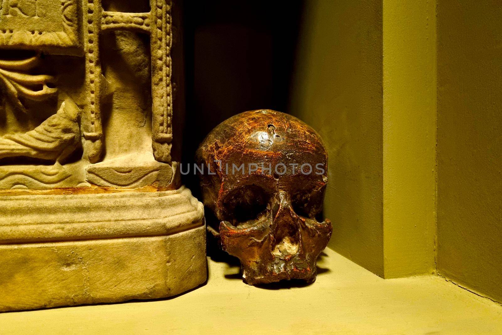 Close-up on a human skull made of metal