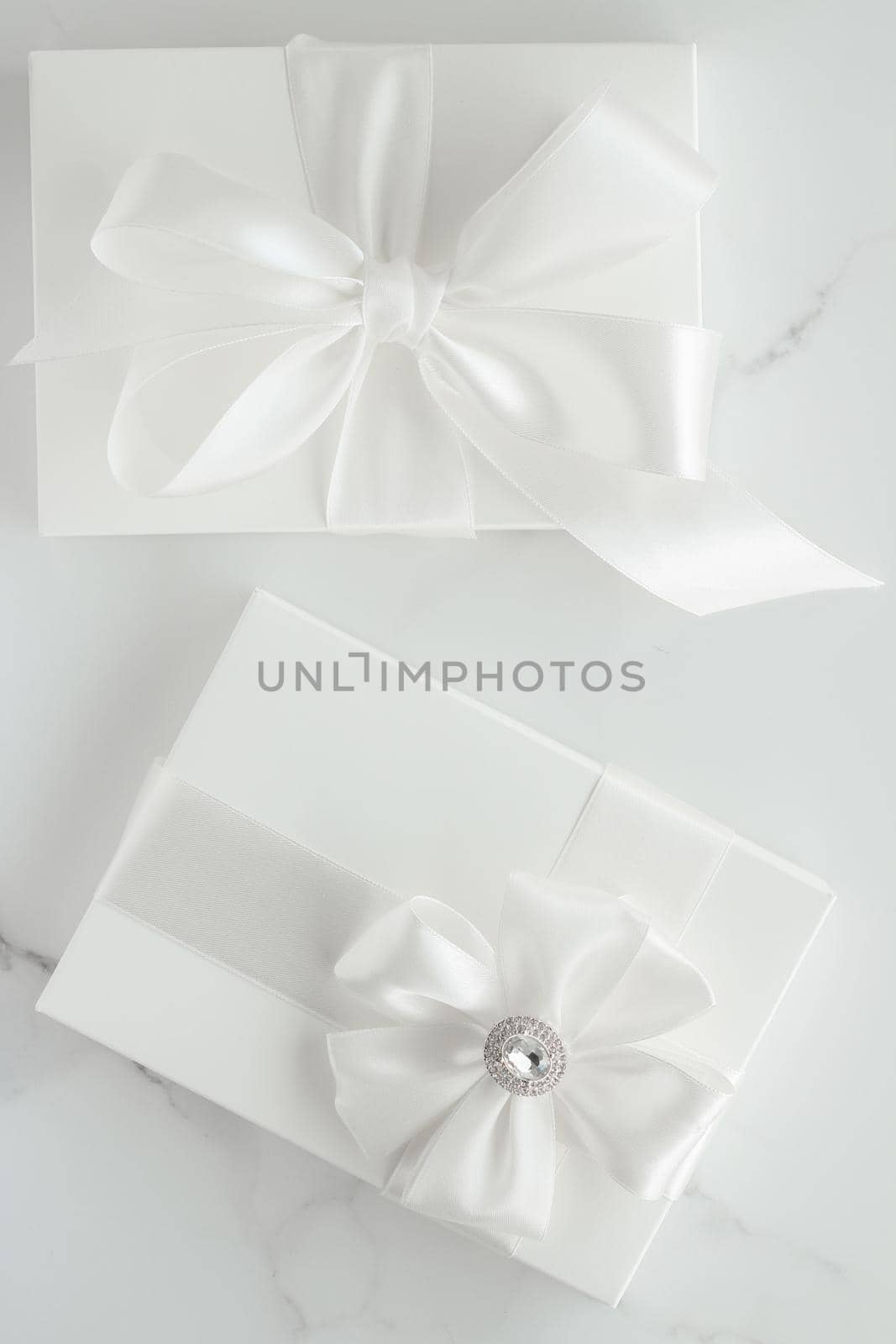 Romantic celebration, lifestyle and holiday present concept - Luxury wedding gifts on marble