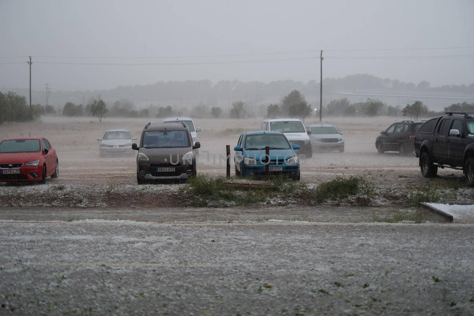 Impact on cars of the Hailstorm caused by the meteorological phenomenon DANA in Barcelona- El Bruc, Spain 25 August 2022. natural light
