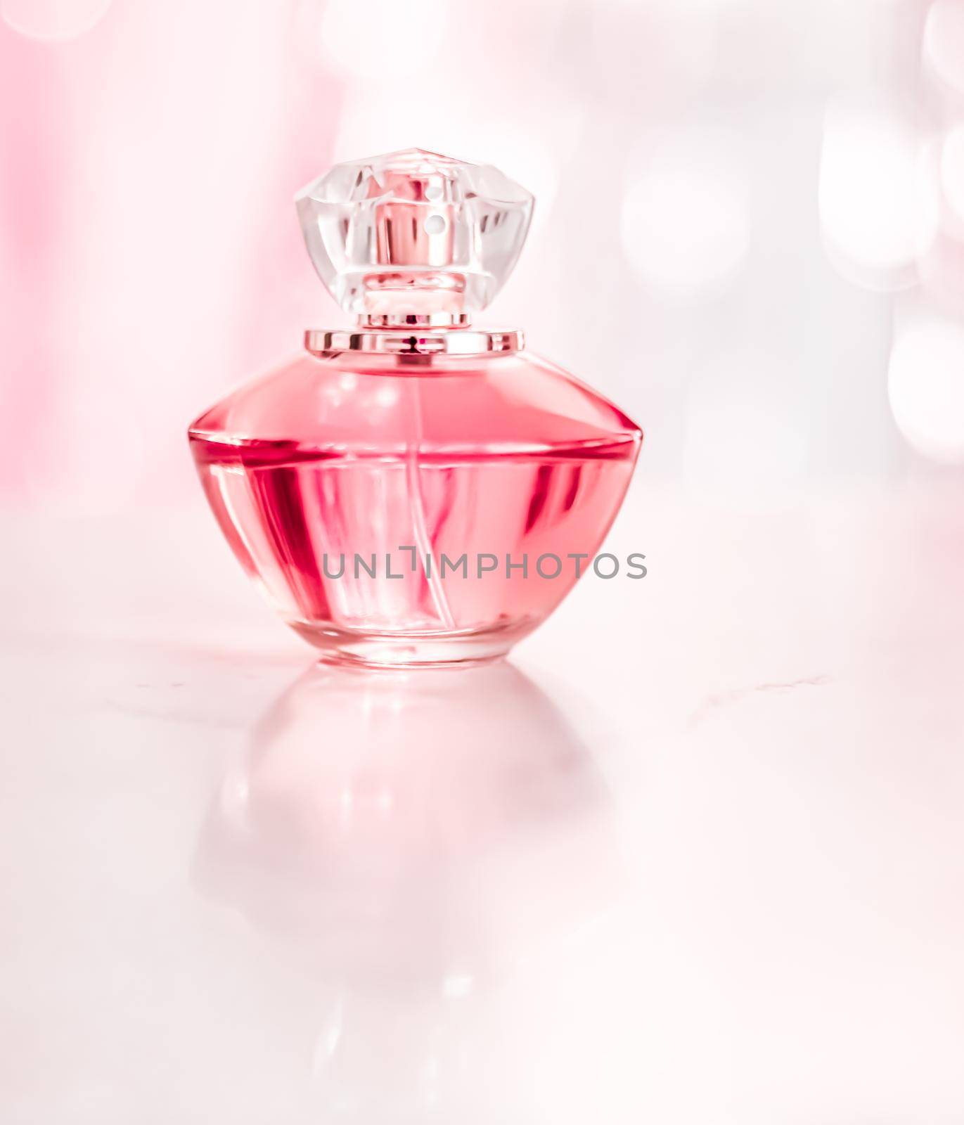 Perfume bottle on glamour background, floral feminine scent, fragrance and eau de parfum as luxury holiday gift, cosmetic and beauty brand present concept