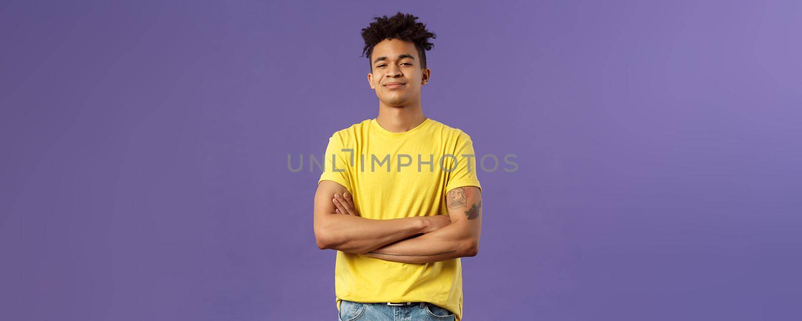 Close-up portrait of arrogant, proud and boastful young smart guy cross hands over chest in confident, self-assured pose, smirk and look mighty, feel like he knows everything, purple background.