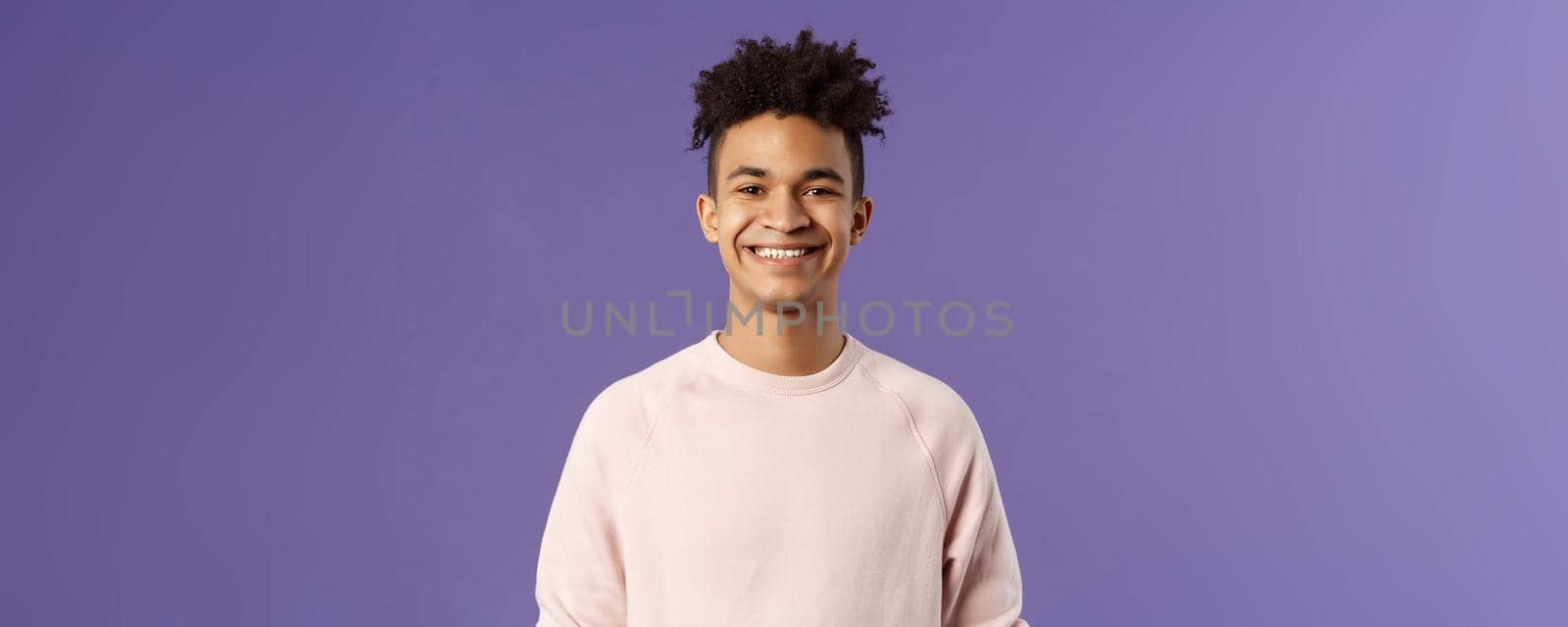 Close-up portrait of cheerful young hipster guy with dreads, smiling optimistic and delighted, standing purple background, having lucky good day, express positivity and joy by Benzoix