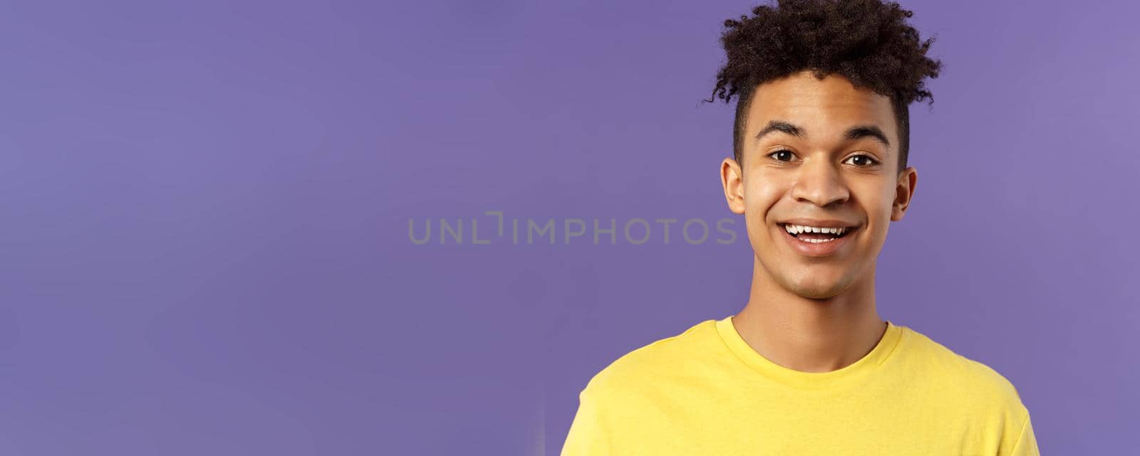 Close-up portrait of cheerful smiling man looking happy, express enthusiastic optimistic emotions, seeing something pleasant and interesting, standing purple background by Benzoix