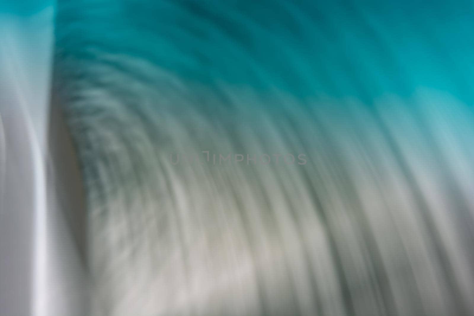 Gray-turquoise ripples, abstraction from small waves. Abstraction water. Backdrop