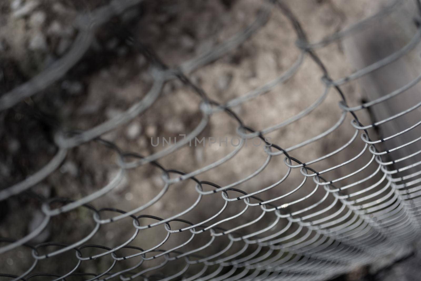 Metal mesh taken at an angle, from top to bottom. Abstraction. Backdrop