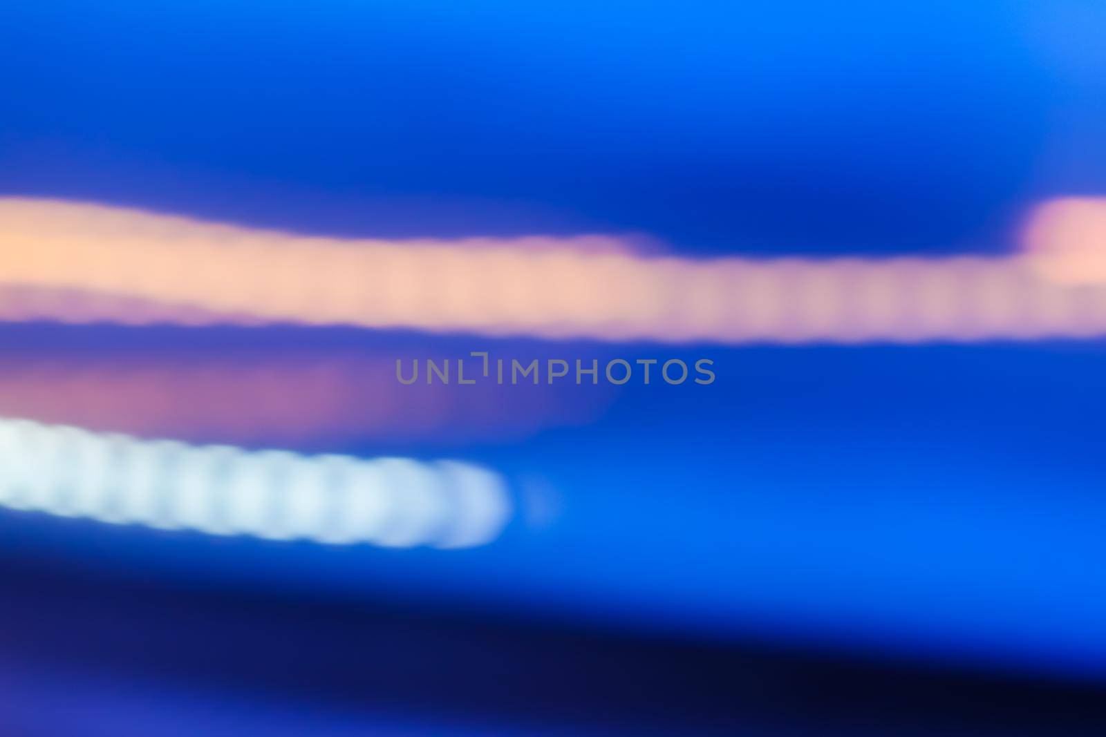 Abstract background, defocused textures and modern design concept - Evening city lights in motion