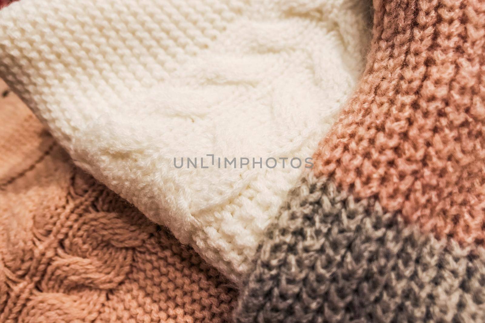 Knitwear, fabric textures and rustic lifestyle concept - Knitted winter clothes