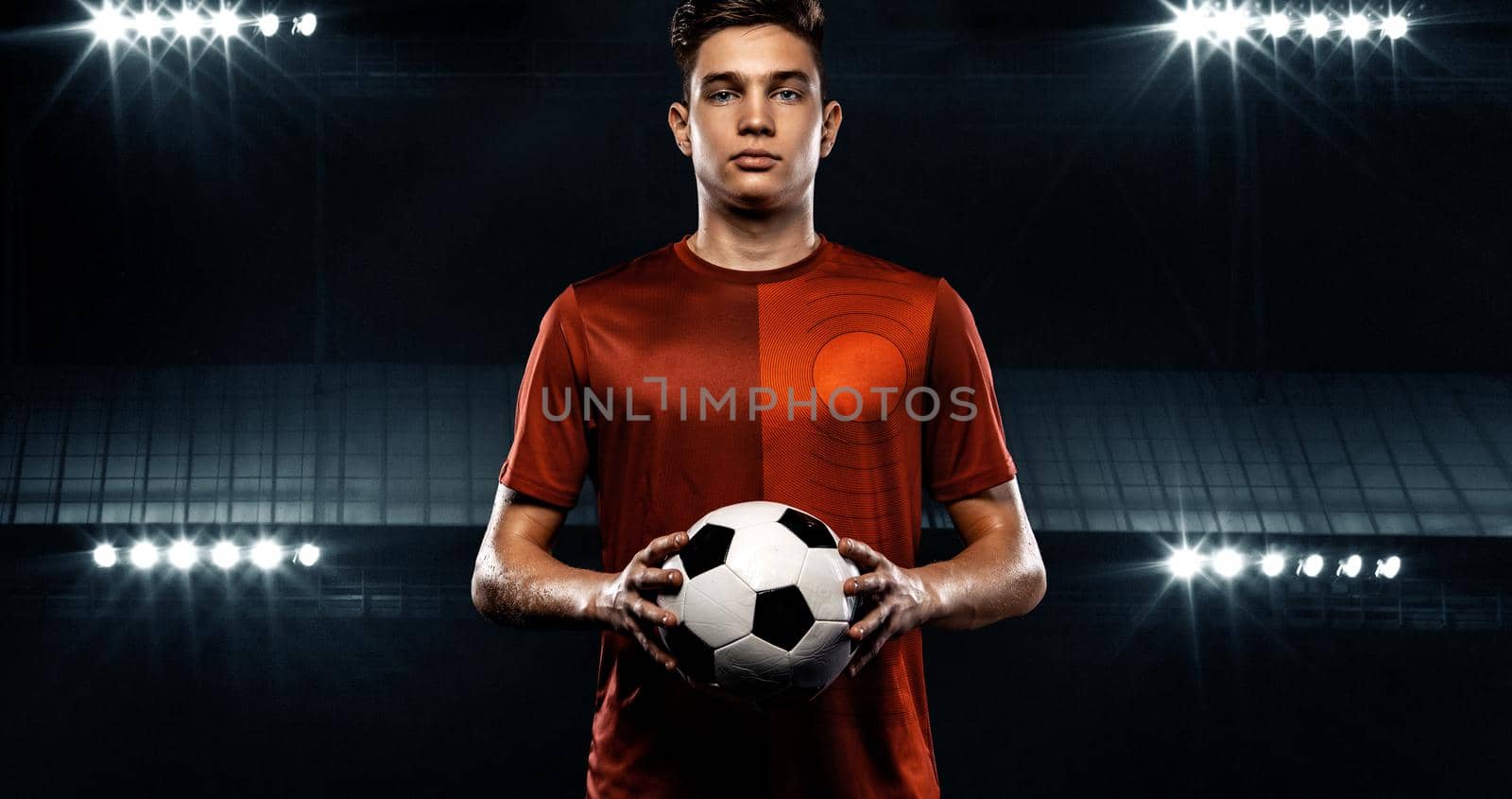 Teenager - soccer player. Boy in football sportswear after game with ball. Sport concept. by MikeOrlov