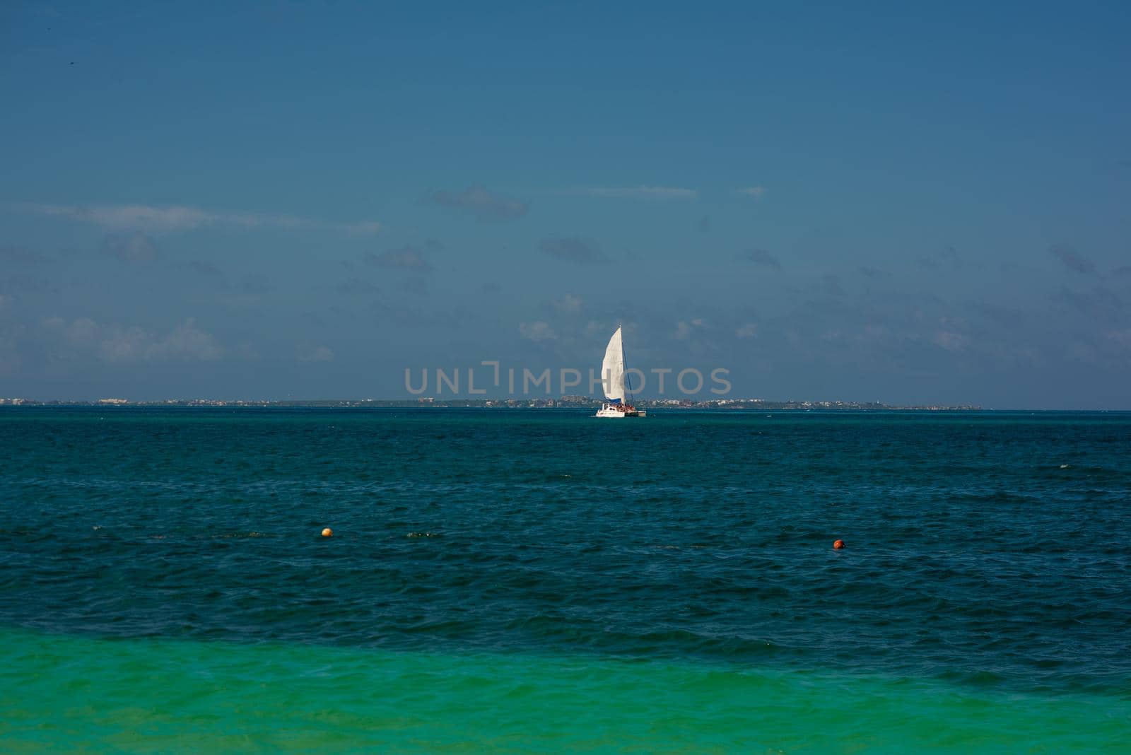 Sailboat in the sea luxury summer adventure, active vacation in Mediterranean sea. Blue water color