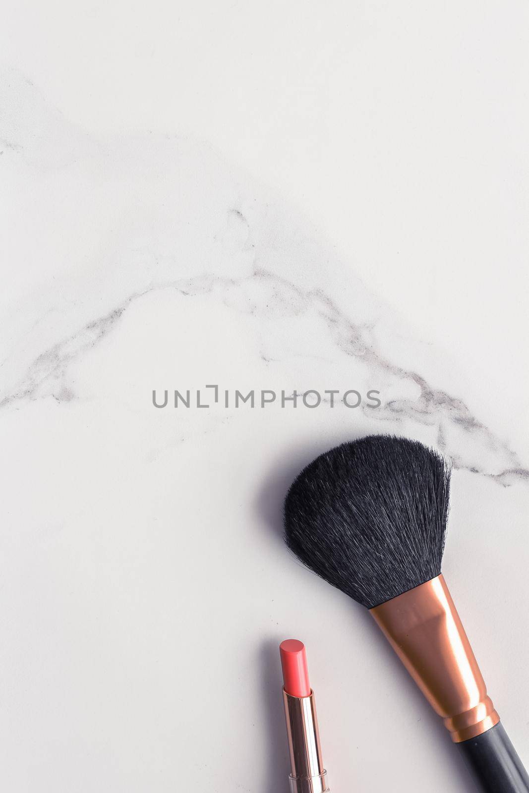 Make-up and cosmetics flatlay on marble by Anneleven