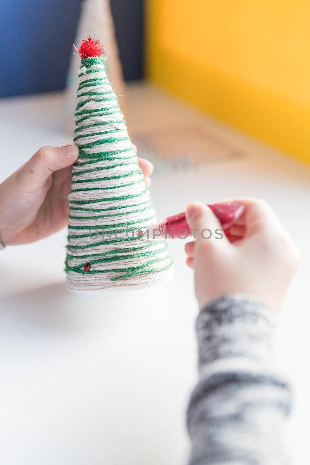 Happy New Year decoration. Children's DIY concept. Handmade crafts on holiday with your own hands.