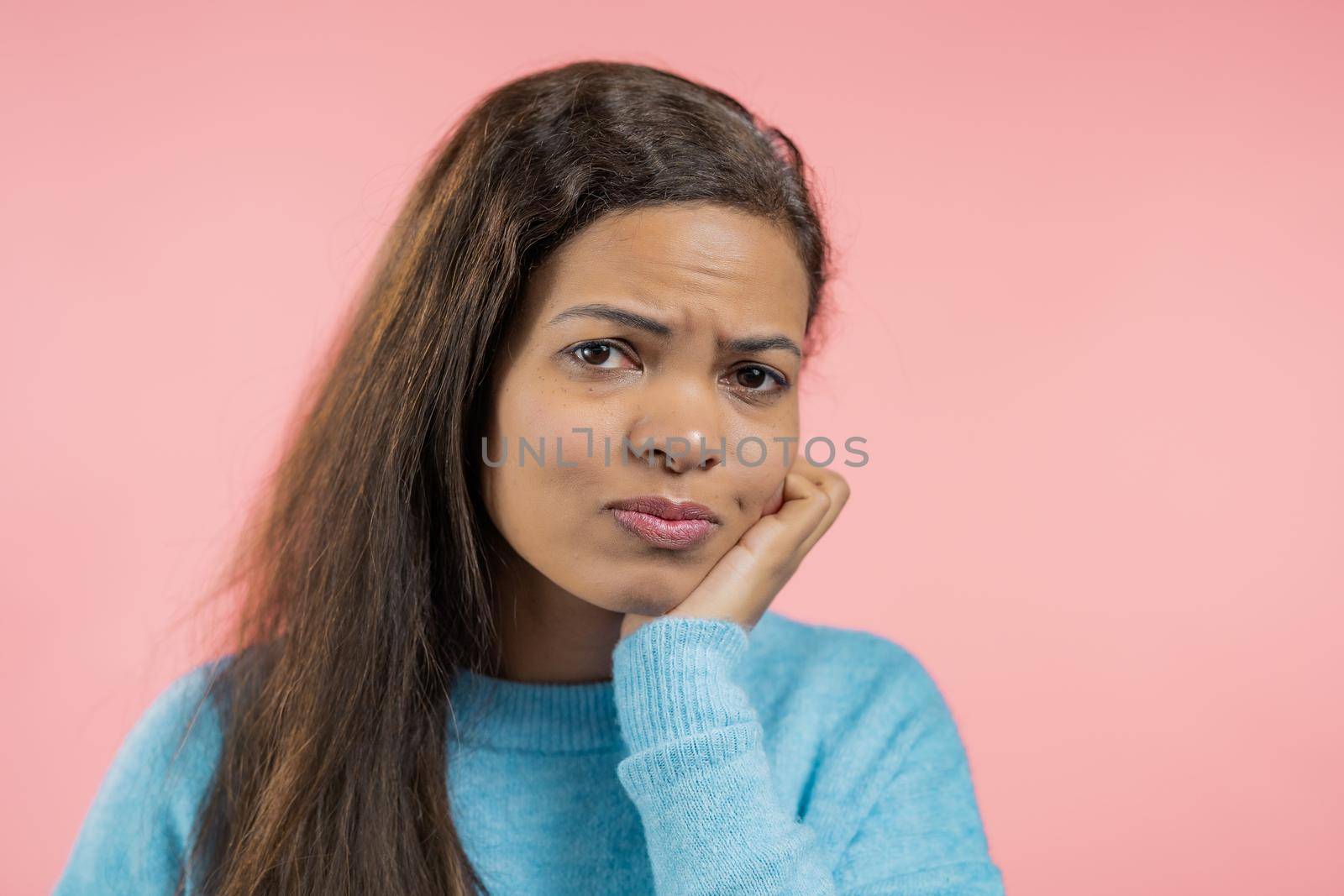 African mature woman have tooth pain on pink studio background. Toothache, dental problems, stomatology and medicine concept. High quality photo