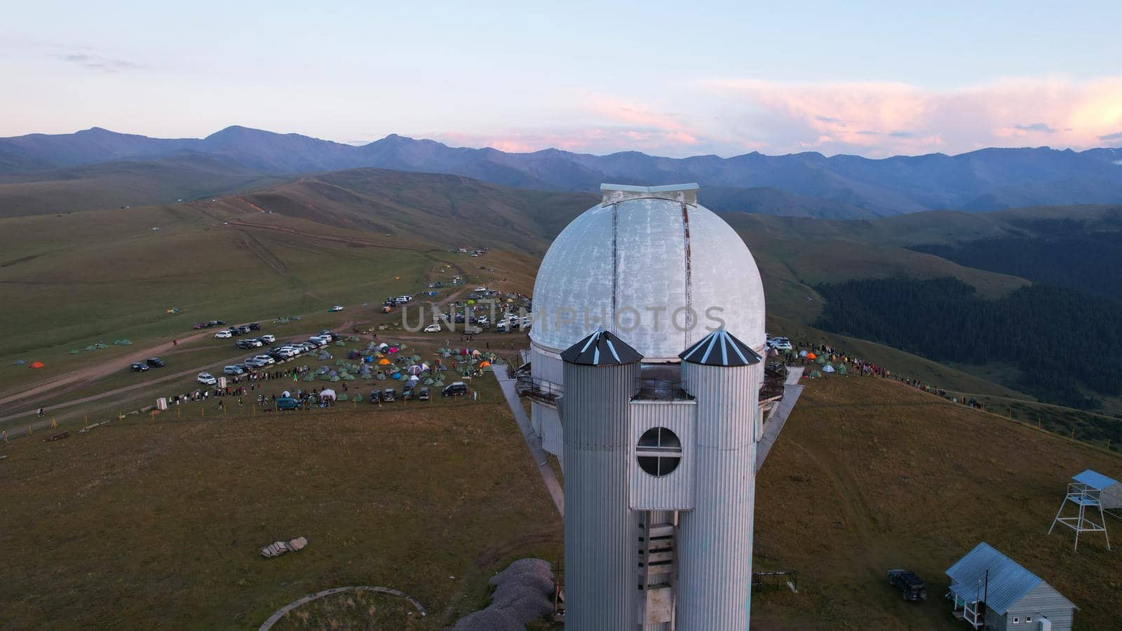Two large telescope domes at sunset. Drone view by Passcal
