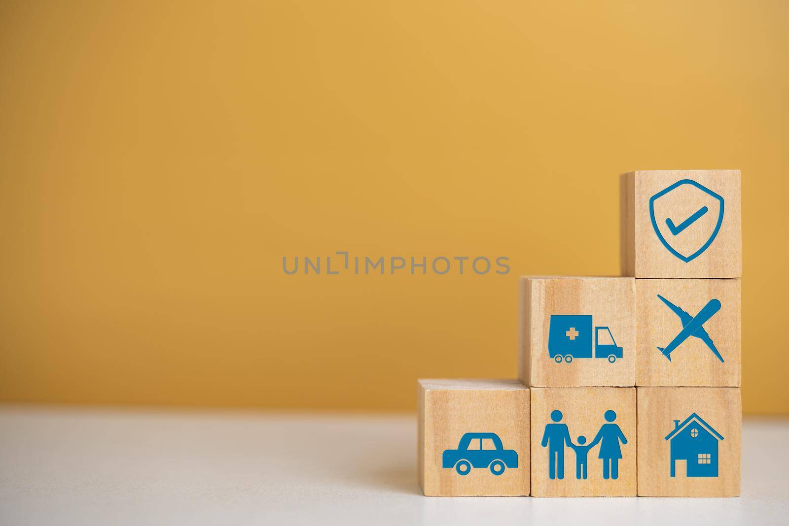 Business insurance online digital car home travel health care icon wood cube block on desk concept. by aoo3771