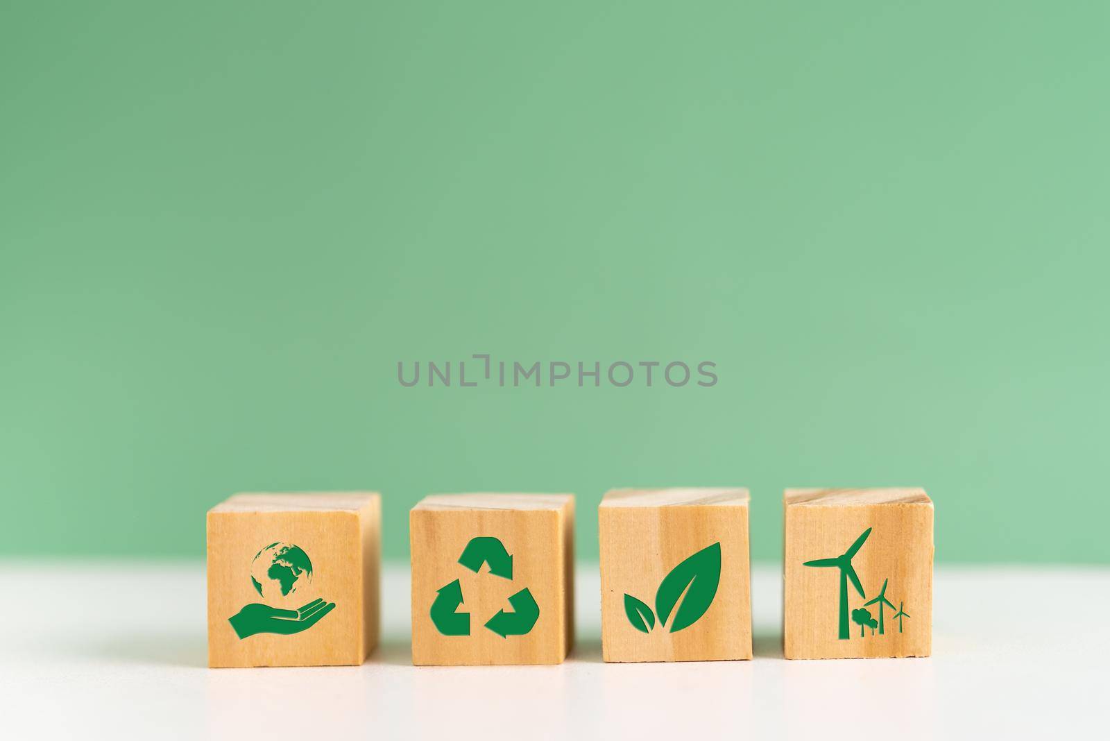 Wood cube block Esg Environmental Social and Governance eco concept of sustainable development of the organization.Investing and management of pollution to reduce global warming.