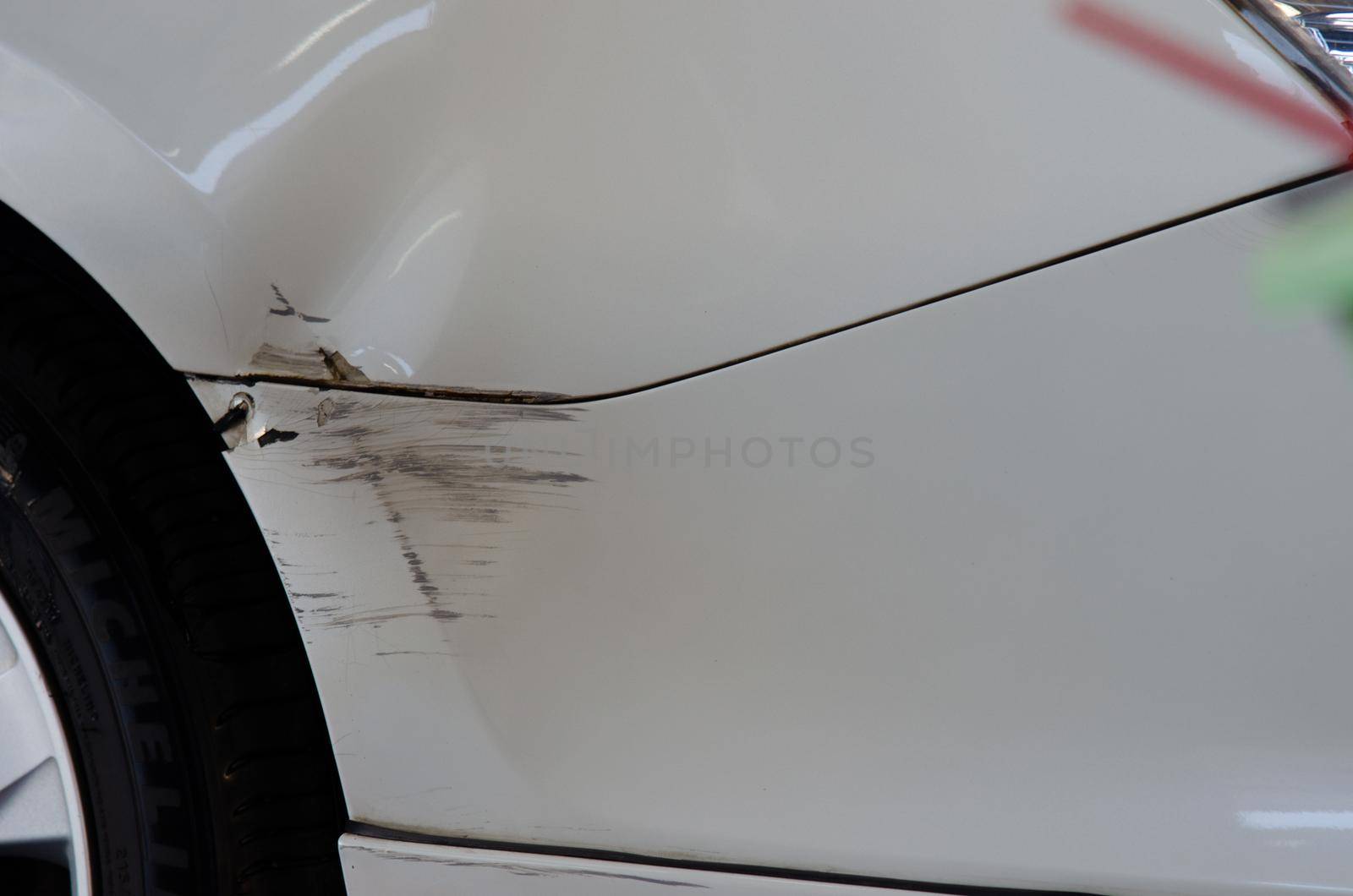 White car accident with abrasions. Concept car insurance business. by aoo3771