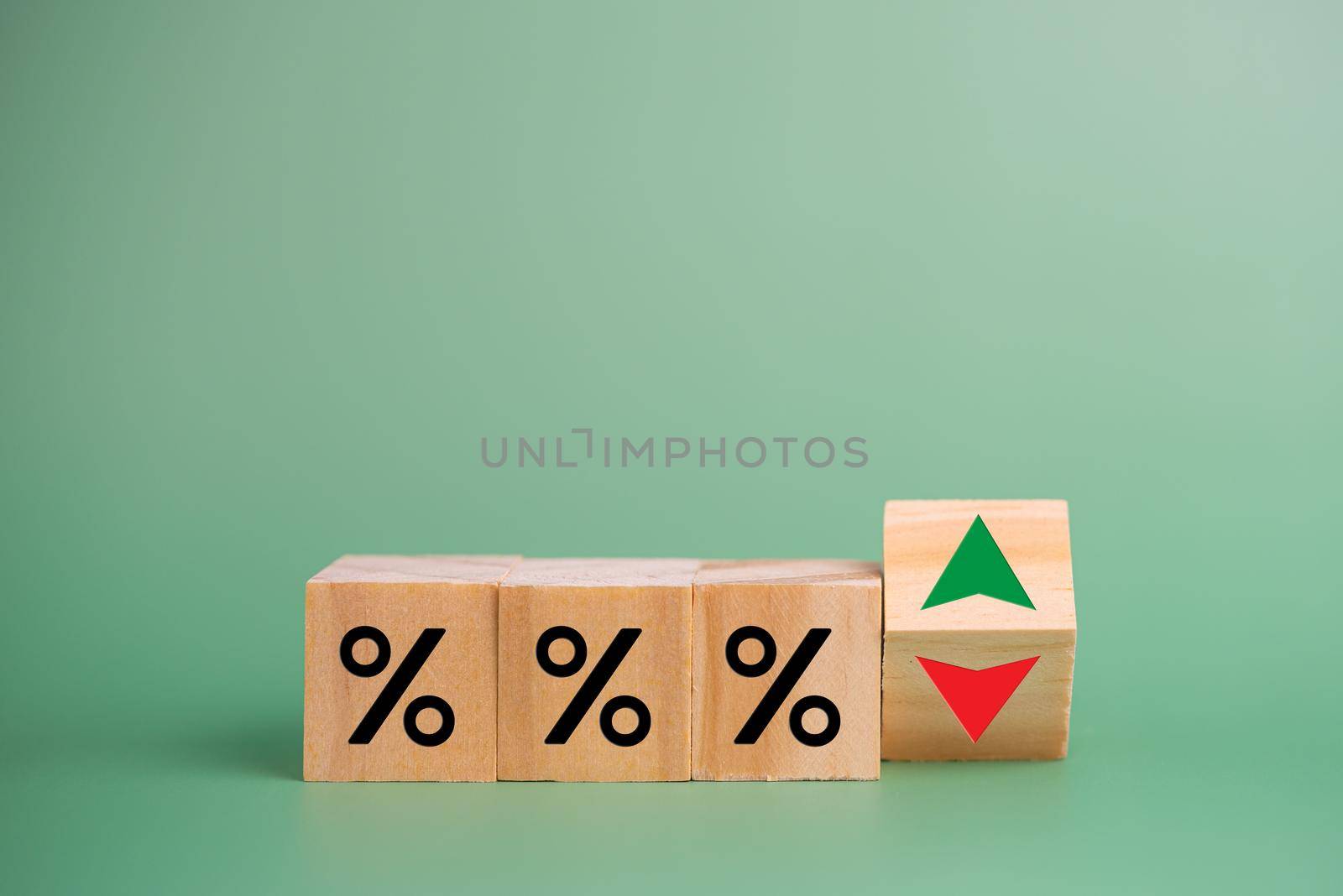 Business finance and banking investments economy inflation with wood cube on desk. by aoo3771