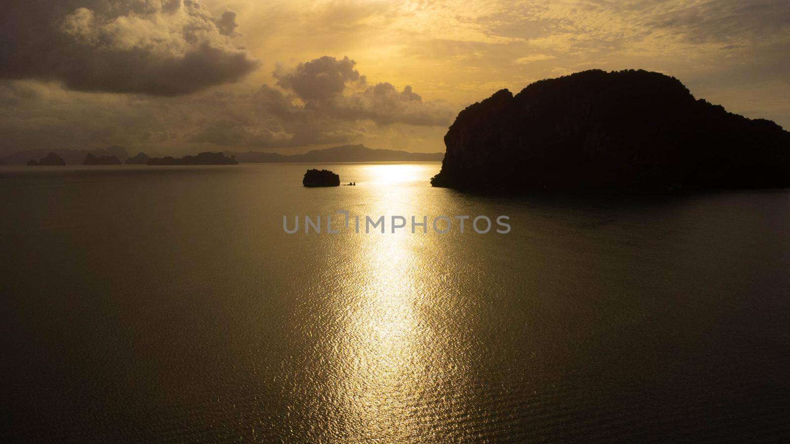 Beautiful view of the island in the tropical sea during sunset, Phang Nga, Thailand. Beautiful natural landscape background.